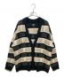 UGG（アグ）の古着「Graphic Logo Cardigan」｜ホワイト×ブラック