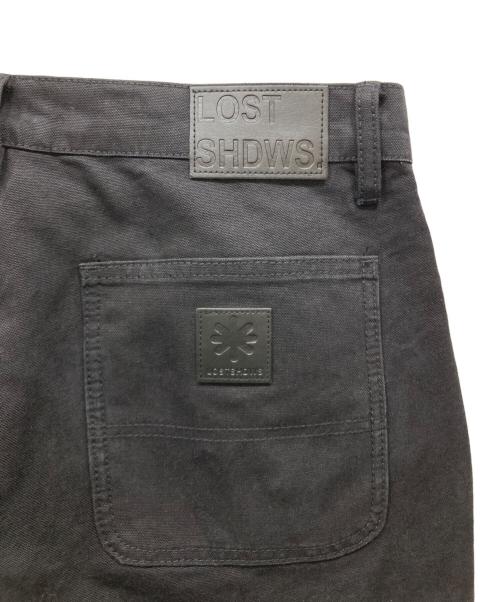 LOSTSHDWS（ロストシャドーズ）LOSTSHDWS (ロストシャドーズ) プリントフレアデニムパンツ ブラック サイズ:SIZE 86cm (W34)の古着・服飾アイテム