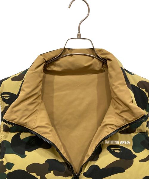 A BATHING APE（アベイシングエイプ）A BATHING APE (アベイシングエイプ) Camo Reversible Down Vest オリーブ サイズ:Mの古着・服飾アイテム