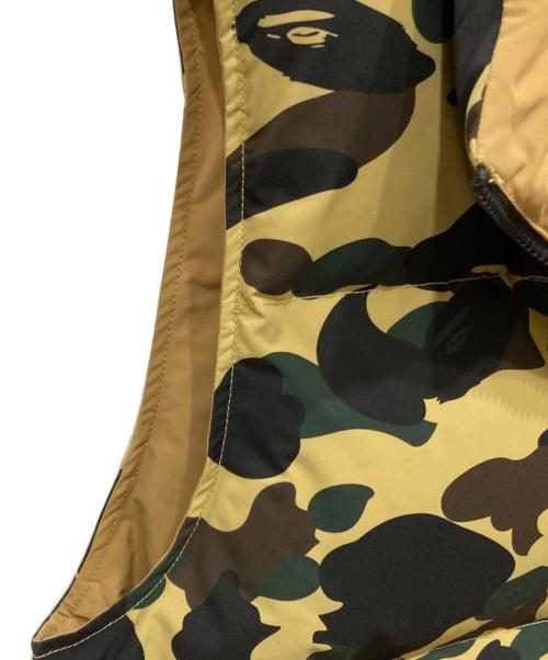 A BATHING APE（アベイシングエイプ）A BATHING APE (アベイシングエイプ) Camo Reversible Down Vest オリーブ サイズ:Mの古着・服飾アイテム
