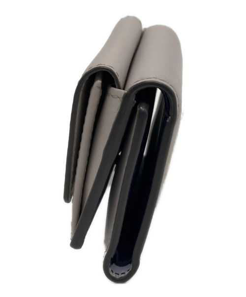 TOD'S（トッズ）TOD'S (トッズ) 2つ折り財布 グレーの古着・服飾アイテム