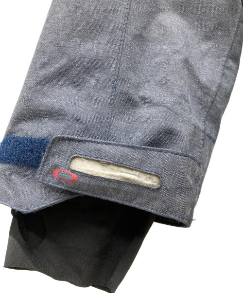 OAKLEY（オークリー）OAKLEY (オークリー) スノーウェアジャケット/タウンユース/13aw ブルー×レッド サイズ:Lの古着・服飾アイテム