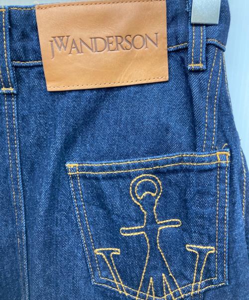 J.W.ANDERSON（ジェイダブリューアンダーソン）J.W.ANDERSON (ジェイダブリューアンダーソン) 裾ロゴ刺繍カットオフデニムスカート/シンメトリーデニムスカート インディゴ サイズ:UK6の古着・服飾アイテム