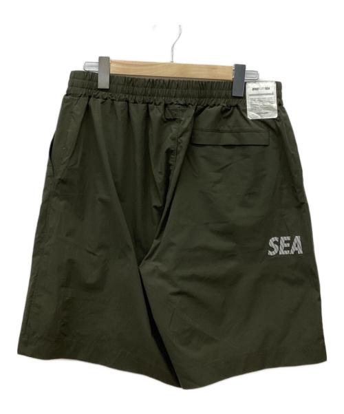 WIND AND SEA（ウィンダンシー）WIND AND SEA (ウィンダンシー) リフレクターロゴショートパンツ オリーブ サイズ:XLの古着・服飾アイテム