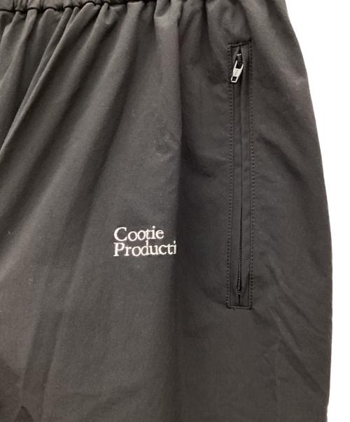COOTIE PRODUCTIONS（クーティープロダクツ）COOTIE PRODUCTIONS (クーティープロダクツ) Nylon Light Cloth Wide Training Pants/ナイロンクロスワイドトレーニングパンツ/ナイロンパンツ ブラック サイズ:Lの古着・服飾アイテム
