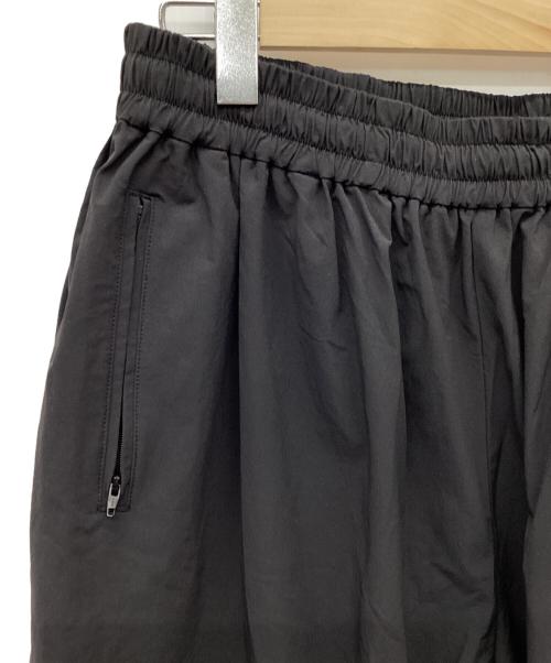 COOTIE PRODUCTIONS（クーティープロダクツ）COOTIE PRODUCTIONS (クーティープロダクツ) Nylon Light Cloth Wide Training Pants/ナイロンクロスワイドトレーニングパンツ/ナイロンパンツ ブラック サイズ:Lの古着・服飾アイテム
