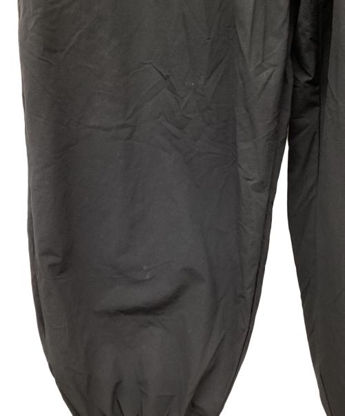 COOTIE PRODUCTIONS（クーティープロダクツ）COOTIE PRODUCTIONS (クーティープロダクツ) Nylon Light Cloth Wide Training Pants/ナイロンクロスワイドトレーニングパンツ/ナイロンパンツ ブラック サイズ:Lの古着・服飾アイテム