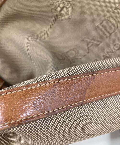 PRADA（プラダ）PRADA (プラダ) ジャガードロゴ キャンバスショルダーバッグ ブラウンの古着・服飾アイテム