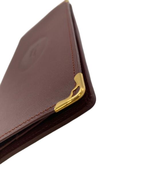 Cartier（カルティエ）Cartier (カルティエ) 札入れ ボルドーの古着・服飾アイテム