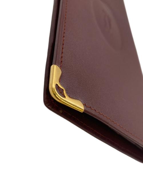 Cartier（カルティエ）Cartier (カルティエ) 札入れ ボルドーの古着・服飾アイテム