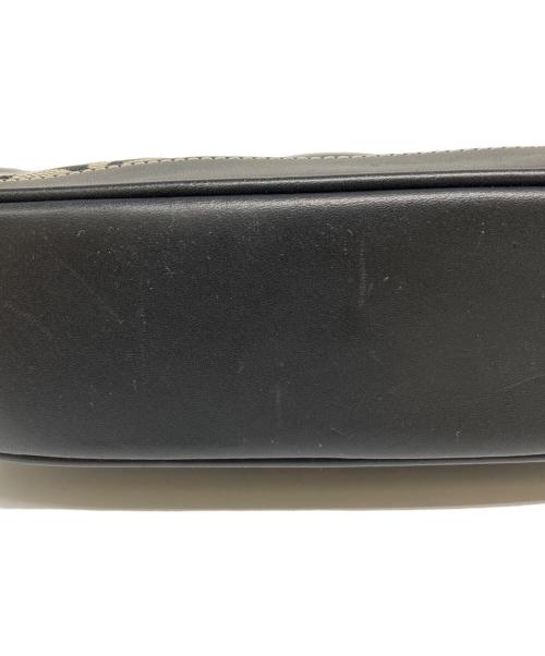 COACH（コーチ）COACH (コーチ) シグネチャーハンドポーチ ベージュ×ブラックの古着・服飾アイテム