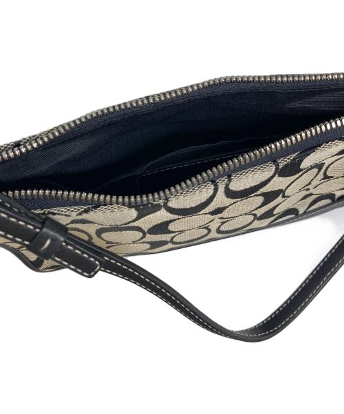 COACH（コーチ）COACH (コーチ) シグネチャーハンドポーチ ベージュ×ブラックの古着・服飾アイテム