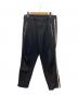 COMME des GARCONS HOMME PLUS（コムデギャルソンオムプリュス）の古着「02SS サイドライントラックパンツ」｜ブラック