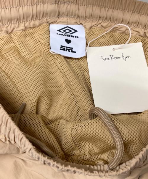 Sea Room lynn（シールームリン）Sea Room Lynn (シールームリン) UMBRO (アンブロ) セットアップ ナイロントラックジャケット&パンツ ベージュ サイズ:FREE 未使用品の古着・服飾アイテム