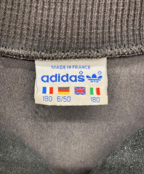 adidas（アディダス）adidas (アディダス) 万国旗タグ ヴィンテージトラックジャケット ブラック サイズ:180　6/50の古着・服飾アイテム