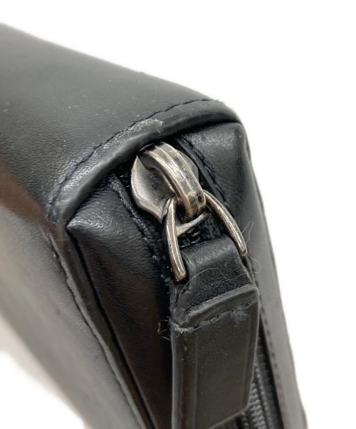 TUMI（トゥミ）TUMI (トゥミ) NASSAU ジップアラウンドトラベルウォレット ブラックの古着・服飾アイテム