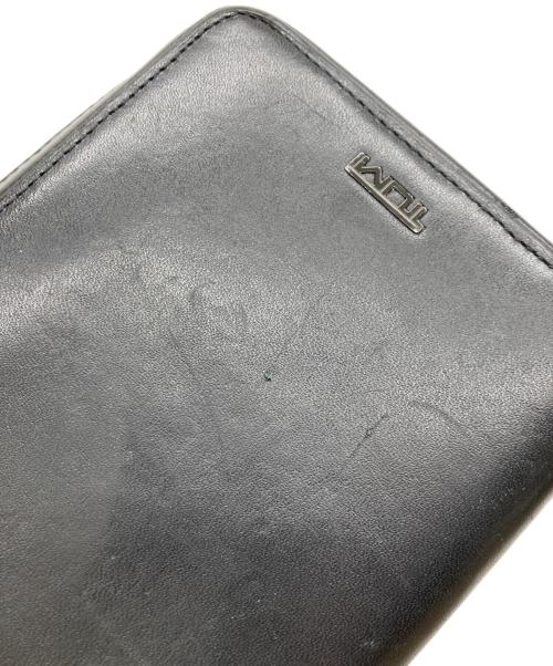 TUMI（トゥミ）TUMI (トゥミ) NASSAU ジップアラウンドトラベルウォレット ブラックの古着・服飾アイテム