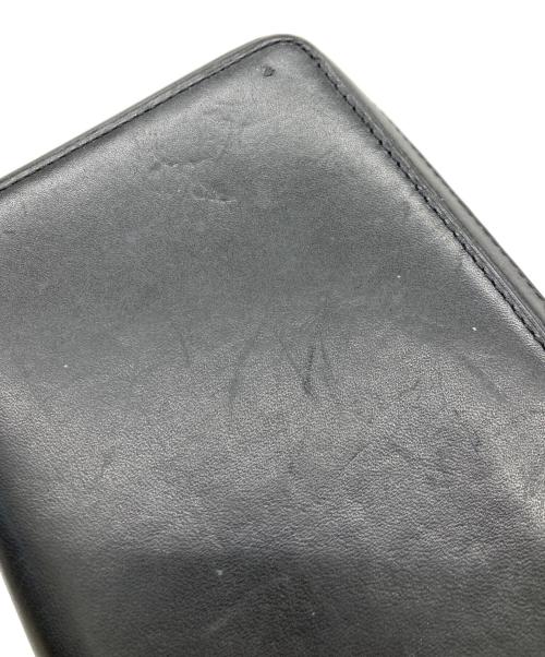 TUMI（トゥミ）TUMI (トゥミ) NASSAU ジップアラウンドトラベルウォレット ブラックの古着・服飾アイテム