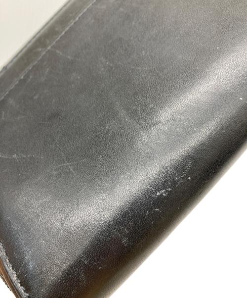 TUMI（トゥミ）TUMI (トゥミ) NASSAU ジップアラウンドトラベルウォレット ブラックの古着・服飾アイテム