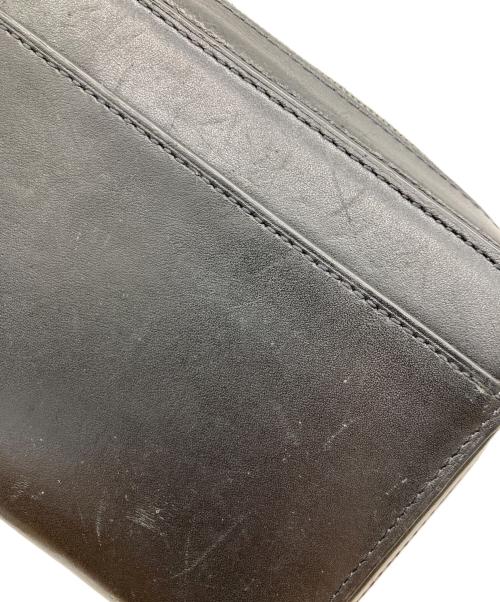 TUMI（トゥミ）TUMI (トゥミ) NASSAU ジップアラウンドトラベルウォレット ブラックの古着・服飾アイテム