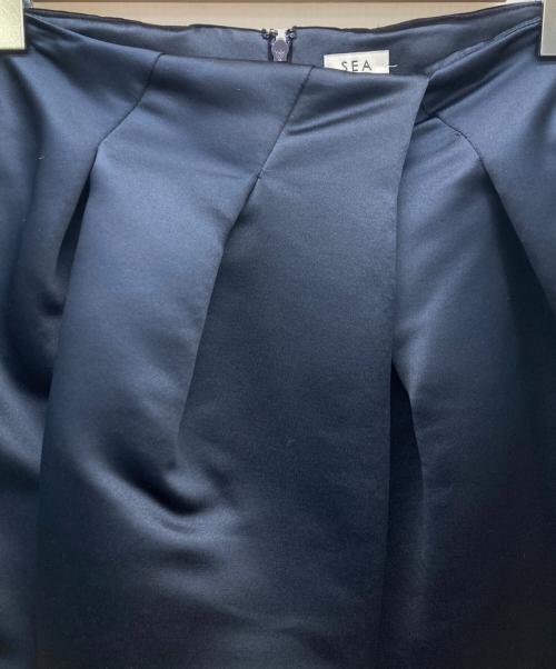 SEA（シー）SEA (シー) HEAVY SATIN ORIGAMI SKIRT ネイビーの古着・服飾アイテム
