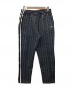 LACOSTEラコステ）の古着「サイドテーピングモノグラムジャカードトラックパンツ」｜グレー