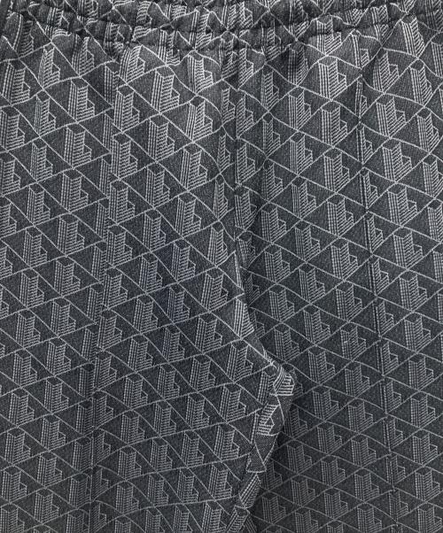 LACOSTE（ラコステ）LACOSTE (ラコステ) サイドテーピングモノグラムジャカードトラックパンツ グレー サイズ:US XSの古着・服飾アイテム