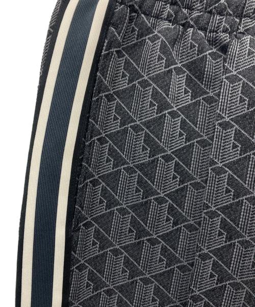 LACOSTE（ラコステ）LACOSTE (ラコステ) サイドテーピングモノグラムジャカードトラックパンツ グレー サイズ:US XSの古着・服飾アイテム