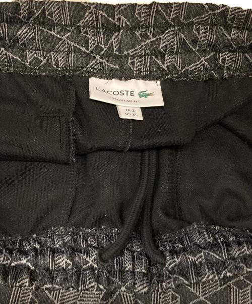 LACOSTE（ラコステ）LACOSTE (ラコステ) サイドテーピングモノグラムジャカードトラックパンツ グレー サイズ:US XSの古着・服飾アイテム