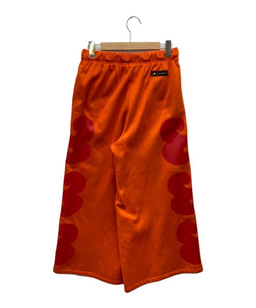 adidas（アディダス）adidas (アディダス) marimekko (マリメッコ) wide gaucho sweat pants オレンジ サイズ:Lの古着・服飾アイテム