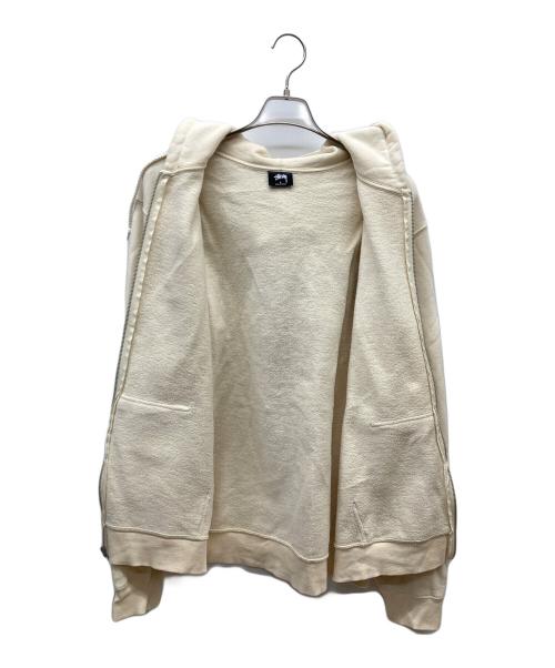stussy（ステューシー）stussy (ステューシー) WORLD TOUR ZIP HOOD/ワールドツアージップパーカージップパーカー ベージュ サイズ:Lの古着・服飾アイテム