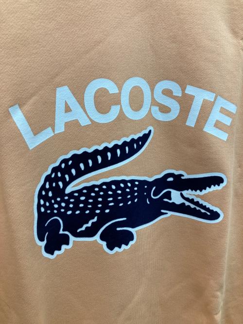 LACOSTE（ラコステ）LACOSTE (ラコステ) ビッグクロックカレッジロゴクルーネックスウェット オレンジ サイズ:L 未使用品の古着・服飾アイテム