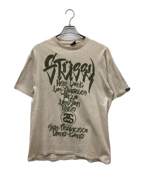 stussy（ステューシー）stussy (ステューシー) WORLD TOUR Tシャツ ベージュ サイズ:Lの古着・服飾アイテム