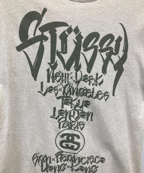 stussy（ステューシー）stussy (ステューシー) WORLD TOUR Tシャツ ベージュ サイズ:Lの古着・服飾アイテム