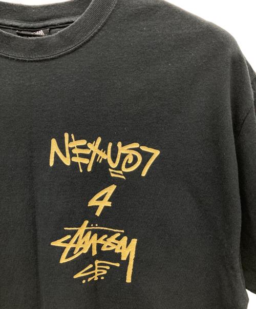 stussy（ステューシー）stussy (ステューシー) NEXUSVII (ネクサスセブン) プリントTシャツ ブラック サイズ:Lの古着・服飾アイテム