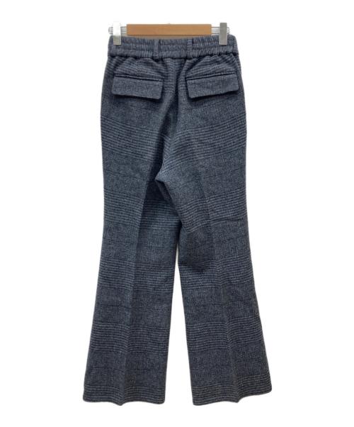 SUBLATIONS（サブレーションズ）SUBLATIONS (サブレーションズ) HEAVY WOOL GABARDINE FLARE EASY TROUSERS グレー×ブルーの古着・服飾アイテム