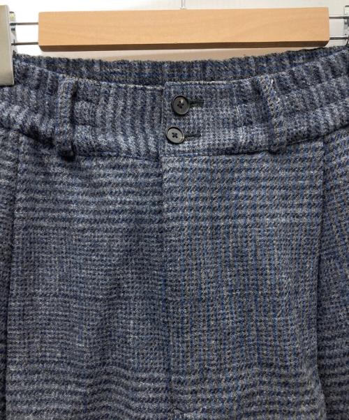 SUBLATIONS（サブレーションズ）SUBLATIONS (サブレーションズ) HEAVY WOOL GABARDINE FLARE EASY TROUSERS グレー×ブルーの古着・服飾アイテム