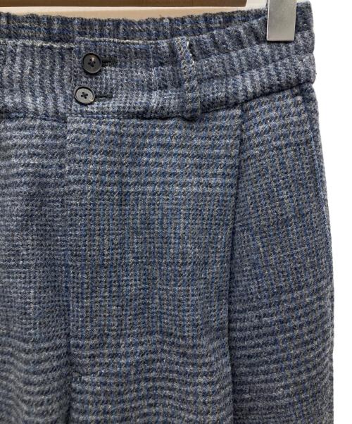 SUBLATIONS（サブレーションズ）SUBLATIONS (サブレーションズ) HEAVY WOOL GABARDINE FLARE EASY TROUSERS グレー×ブルーの古着・服飾アイテム