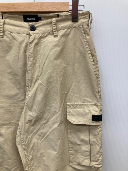 X-LARGE（エクストララージ）X-LARGE (エクストララージ) RIPSTOP カーゴパンツ ベージュ サイズ:SIZE W32の古着・服飾アイテム