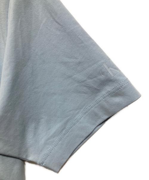 Calvin Klein Jeans（カルバンクラインジーンズ）Calvin Klein Jeans (カルバンクラインジーンズ) ロゴプリントTシャツ ブルー サイズ:Mの古着・服飾アイテム