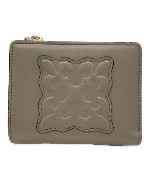 russet（ラシット）russet (ラシット) 2つ折り財布 / レザーモチーフハーフウォレット ベージュの古着・服飾アイテム