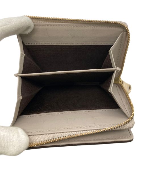 russet（ラシット）russet (ラシット) 2つ折り財布 / レザーモチーフハーフウォレット ベージュの古着・服飾アイテム