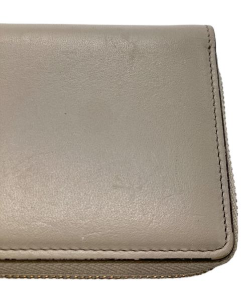 russet（ラシット）russet (ラシット) 2つ折り財布 / レザーモチーフハーフウォレット ベージュの古着・服飾アイテム
