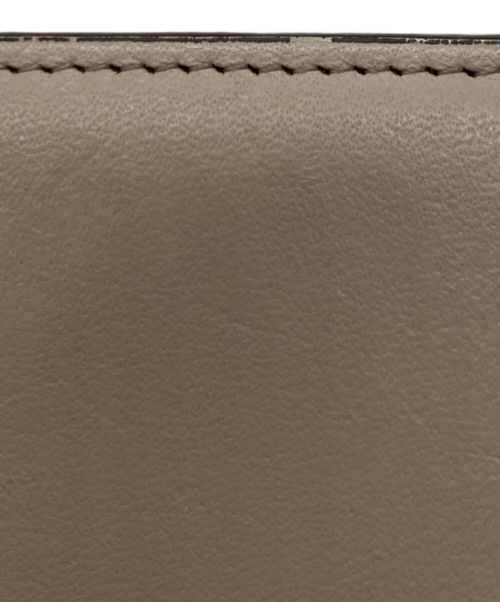 russet（ラシット）russet (ラシット) 2つ折り財布 / レザーモチーフハーフウォレット ベージュの古着・服飾アイテム