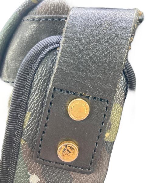 Gentil Bandit（ジャンティバンティ）Gentil Bandit (ジャンティバンティ) ペイント加工リュック オリーブの古着・服飾アイテム