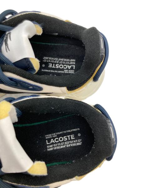 LACOSTE（ラコステ）LACOSTE (ラコステ) スニーカー アイボリー×ネイビー サイズ:EUR 37の古着・服飾アイテム
