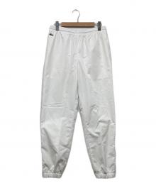 LACOSTE（ラコステ）の古着「ナイロンパンツ」｜ホワイト