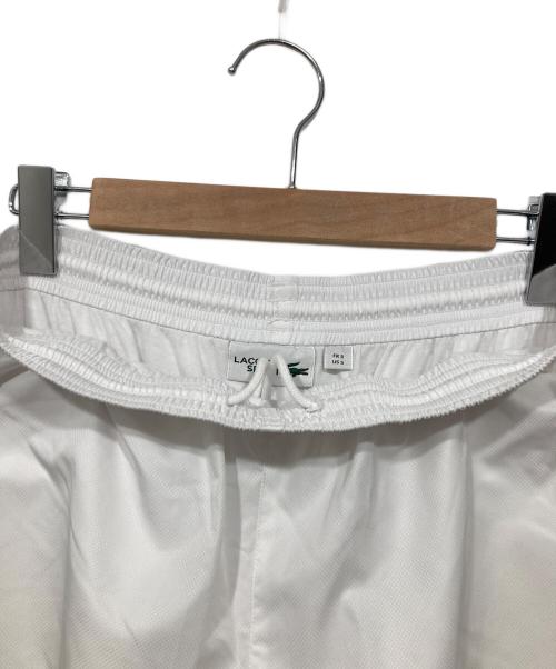 LACOSTE（ラコステ）LACOSTE (ラコステ) ナイロンパンツ ホワイト サイズ:US　Sの古着・服飾アイテム