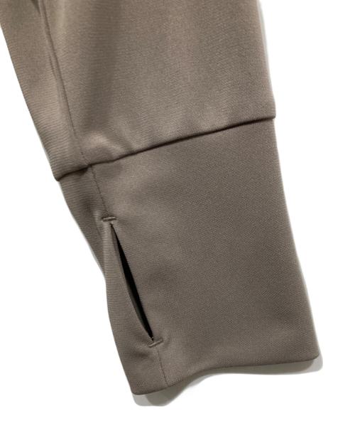 UNFILO（アンフィーロ）UNFILO (アンフィーロ) ペプラムフーディラッシュガード グレー（サンド） サイズ:Mの古着・服飾アイテム