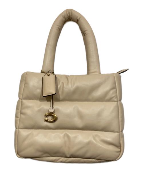 COACH（コーチ）COACH (コーチ) ピロートートバッグ ベージュの古着・服飾アイテム
